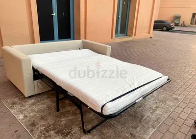 cream sofa bed with mattress  good condition vimle