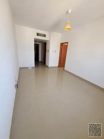 A distinctive and comfortable residential apartment available for annual rent in the Al Rashidiya 3