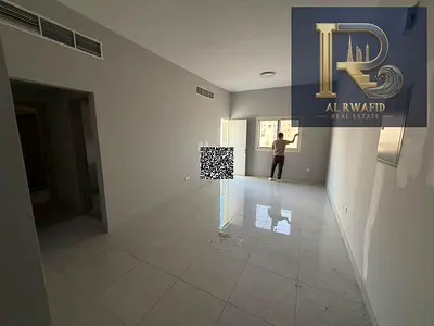 2-bedroom apartment with a living room is available for annual rent in Al Jurf