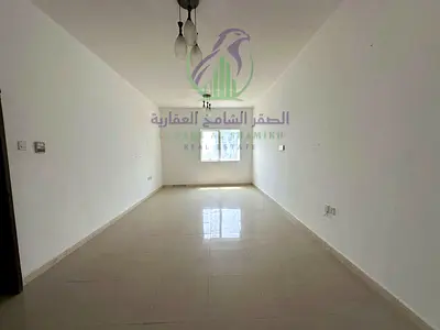 2 bedroom apartment in Al Taawun, Sharjah, featuring a living room, two bathrooms and an open view