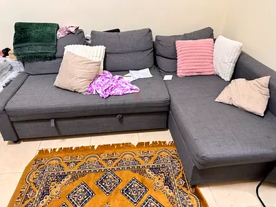 Ikea Lshape sofa with storage and turned to bed