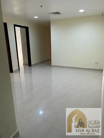 Sharjah apartment for annual rent with central AC, free parking, spacious layout, and prime locatio