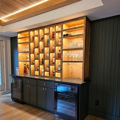 Custom wooden bar cabinet and illuminated shelving