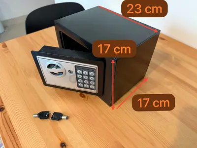 Small electronic home safe with keys - compact 23x17x17 cm. Price 60 AED