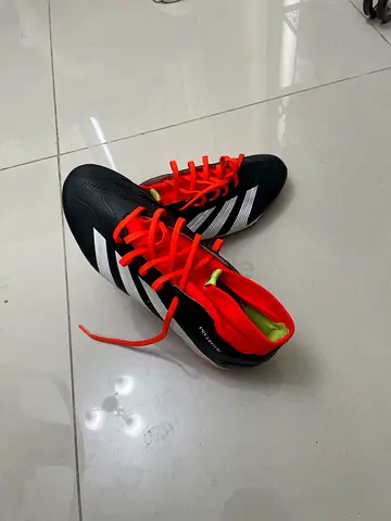 Used Adidas predators football boots, size: 43 1/3 or 9 1/2, black with orange laces