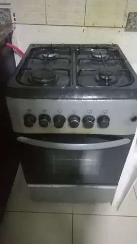 Used 4-Burner Gas Cooker with Oven - Functional, Needs Cleaning