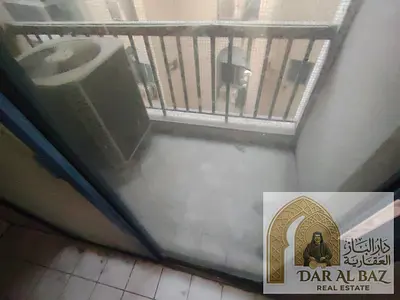Annual apartment for rent in a prime location in Sharjah, featuring a spacious layout, central air