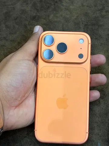 Orange Apple iPhone (custom color) with camera protectors