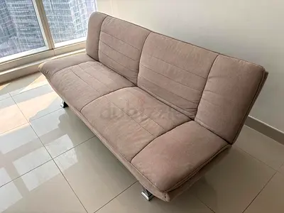 Beige 3-seater convertible sofa bed in excellent condition