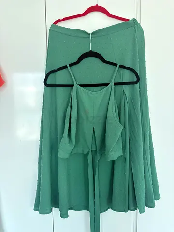 Green two piece co-ord, high waist skirt and halter neck cami