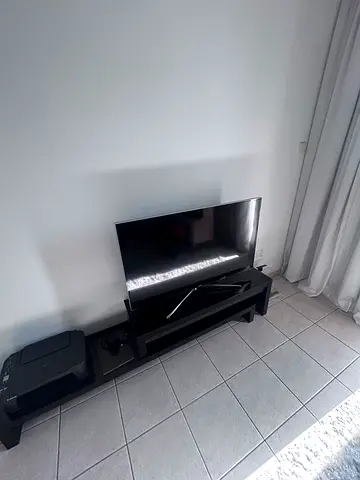 42-55 inch Flat Panel TV in Good Condition with Stand
