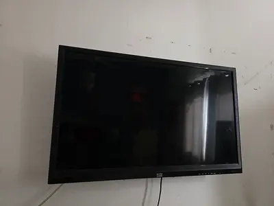 32-inch Wolf LED TV - good working condition, wall-mounted