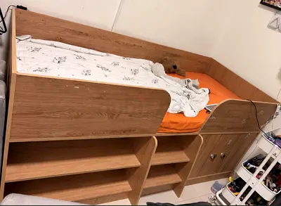 Oak-effect cabin bed with built-in shelves and cupboard - mattress included