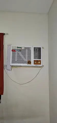Used Window Air Conditioner Unit - Functional, needs cleaning