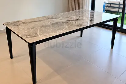 Modern grey marmel dining table with black metal frame