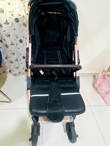 Lightweight black baby stroller - good condition