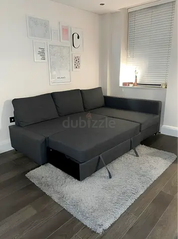 Ikea Dark Grey L-shaped Sofa Bed with Storage - Good Condition