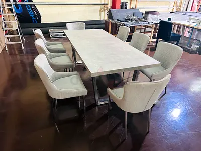Modern rectangular dining table with 8 upholstered chairs