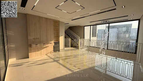 An upscale villa for sale in Al Zorah, Ajman, featuring premium specifications, spacious areas, and