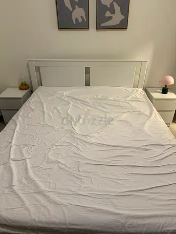 White wooden double bed frame with headboard and mattress two nightstands one drawer good condition