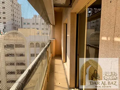 One bedroom and living room in Al Qasimia Balcony Central air conditioning Parking 35,000 AED 4 or