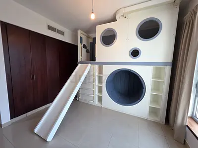 Built-in kids playroom loft with slide and climbing wall and storage - great condition -Moon Kids
