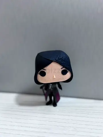 Funko Pop-style Assassin Figurine (hooded character)