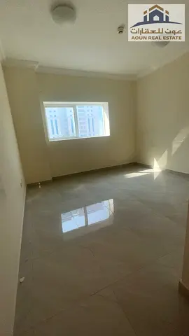 Apartment for annual rent: three bedrooms, a living room, and two bathrooms with a balcony, spaciou