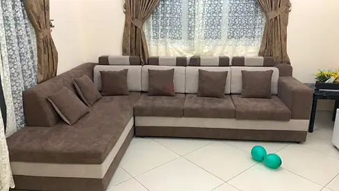 L-shaped sectional sofa in brown-beige fabric — good condition