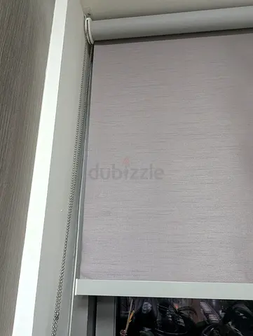 Light grey roller blind with chain control - good condition