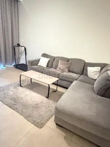 Large Grey L-Shaped Sofa Bed with Pull-Out Bed | 5-Seater