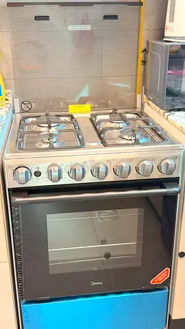 Midea 4-Burner Gas Cooker with Oven - Good Working Condition