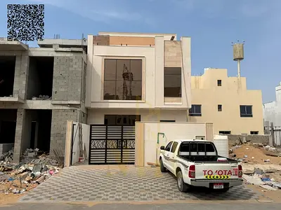 Modern two-story villa with a roof terrace for sale in the Al-Yasmeen area; excellent specifications at an exceptional price—fees included.