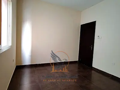 Two-bedroom apartment with a living room and balcony, excellent size and fantastic annual rent price in Ajman