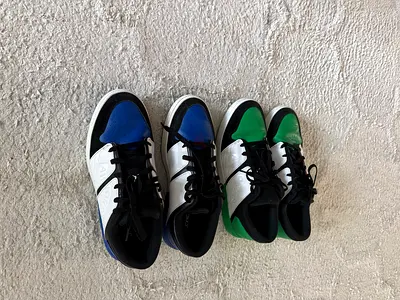 Two pairs of low-top Nike Air Jordan golf shoes US size 10 (green & blue), size unknown