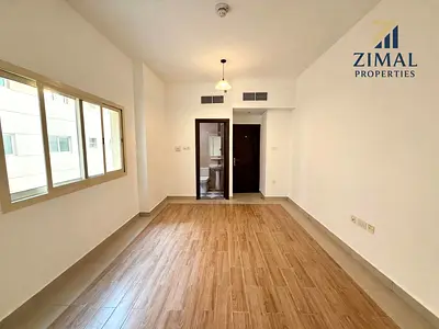 Spacious 1-Bedroom Apartment in Al Nahda 1 | Pool, Gym, Parking & 4 Cheques