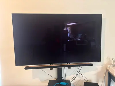 Samsung 65-inch s90c OLED TV with Samsung Soundbar subwoofer on Stand - Good Condition