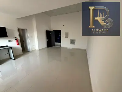 A spacious studio apartment is available for annual rent in Al Rashidiya 2, Ajman, conveniently located next to Ladies Park