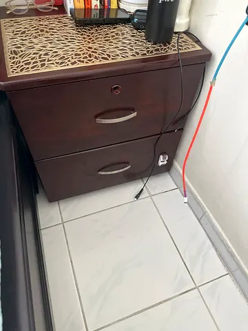 Small dark wood 2-drawer bedside cabinet