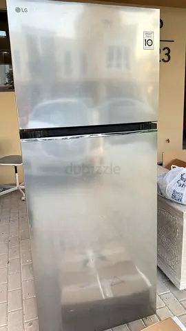 LG Stainless Steel Top Freezer Refrigerator - Good Working Condition