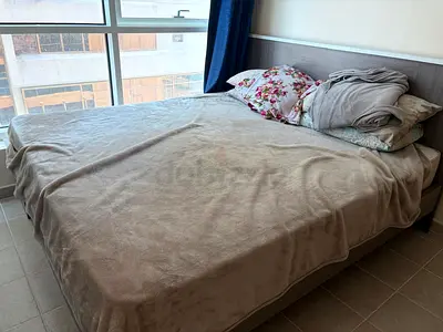 Queen-size bed frame with headboard - good condition