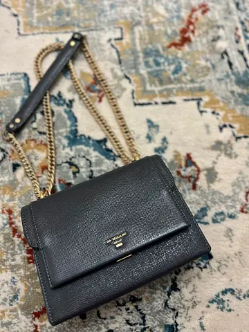 Small gray leather crossbody bag with chain strap