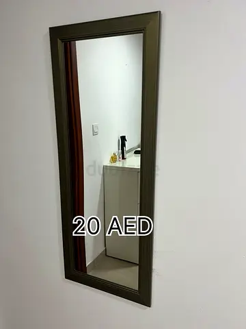 Wall mirror with brown frame