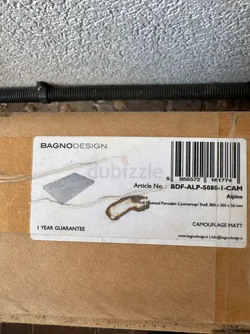 BAGNO DESIGN pack — new camouflage mat sink base in box to be used for sink base bought for 2000AED